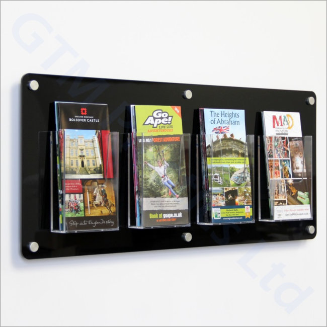 1/3 A4 Leaflet dispensers attached to a black acrylic back-panel mounted to the wall